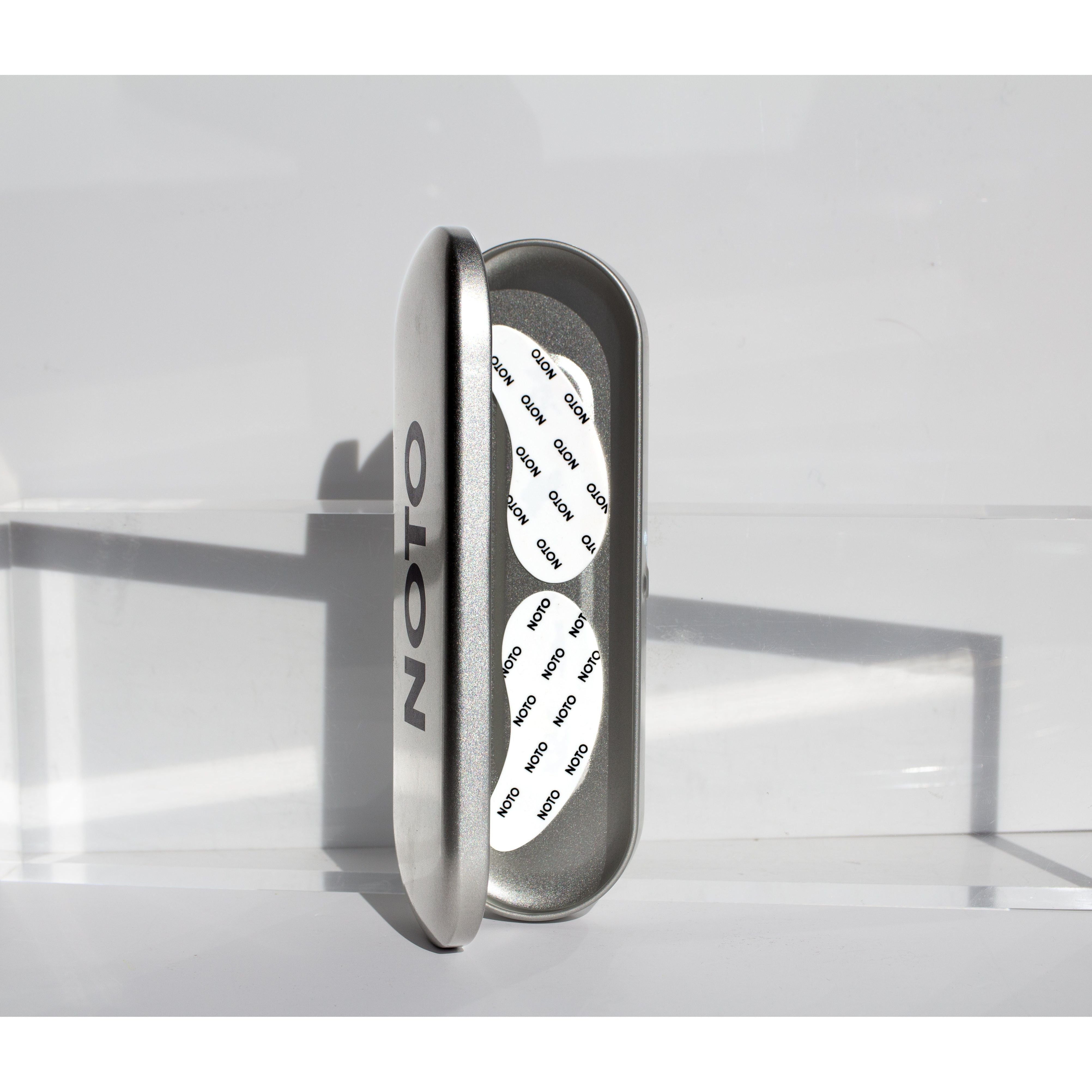 eye patches in case sitting upright against white 